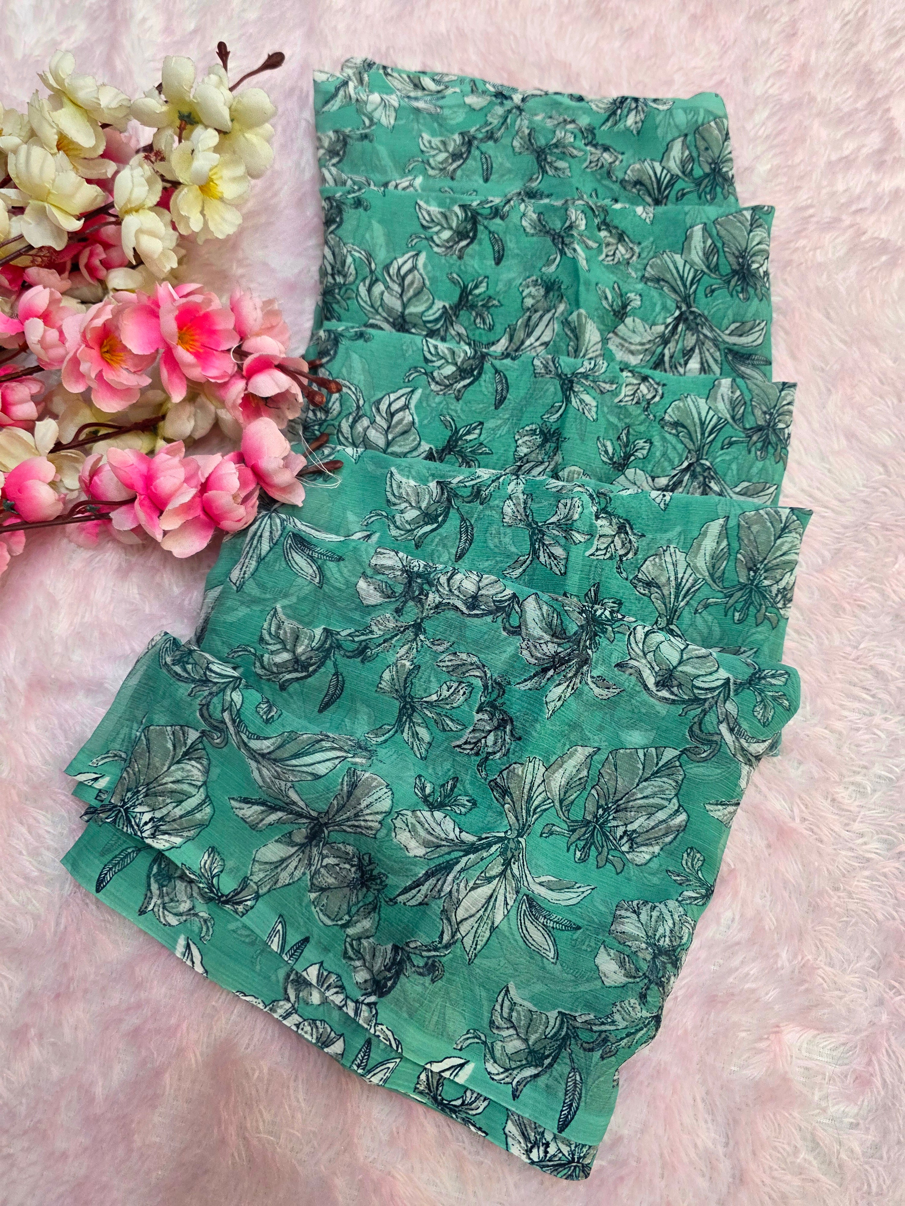 644001 एक्सक्लूसिव शिफॉन फ्लावर प्रिंट साड़ी - हरा