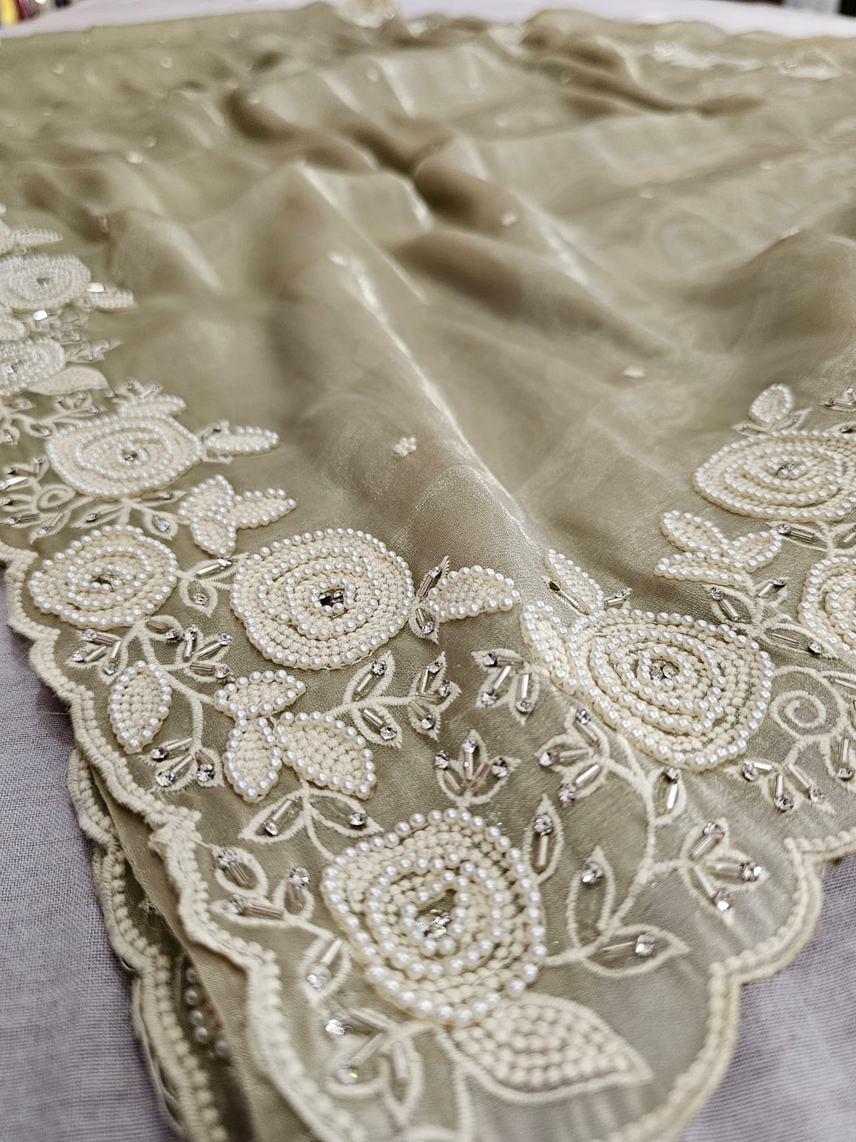 679002 Exclusive Pearl and Resham Work Designer Soft Tissue Silk Saree