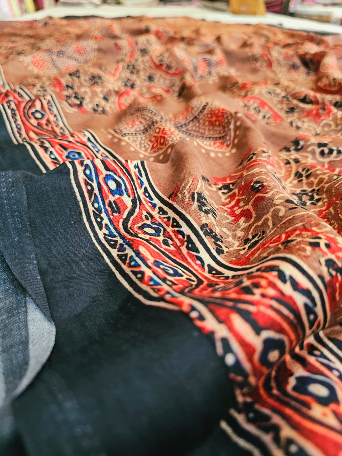 C71002 Exclusive Ajrakh Printed Soft Modal Silk Lagdi Pallu Saree