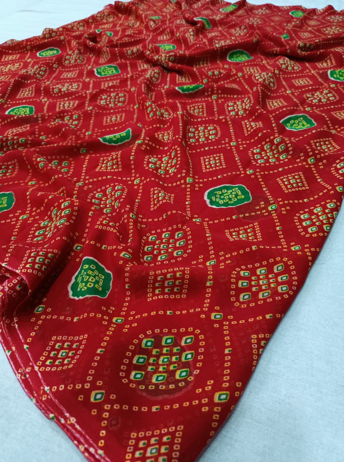 251002 Georgette Laddu Bandhani Print Saree