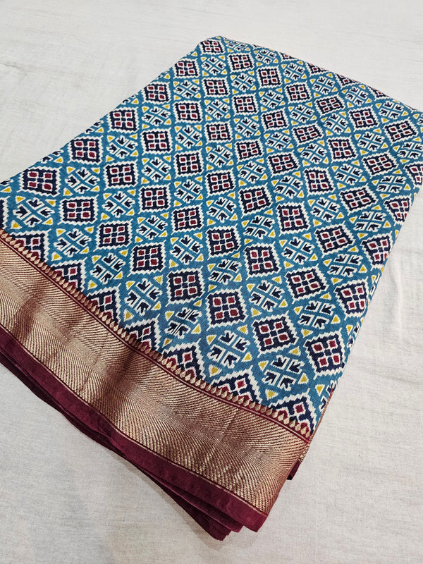 538005 Pure Maslin Patola Print Saree with Zari Border - Teal Blue