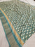 542005 Semi Silk Batik Print Saree With Zari Weaving Border - Teal Green
