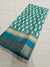 542005 Semi Silk Batik Print Saree With Zari Weaving Border - Teal Blue