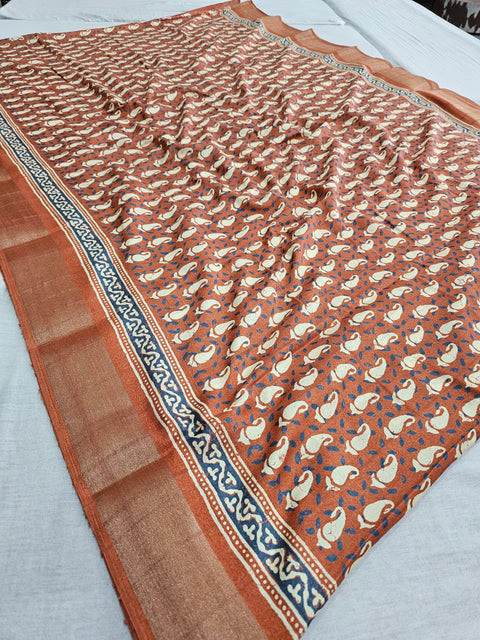 542005 Semi Silk Batik Print Saree With Zari Weaving Border - Rusty