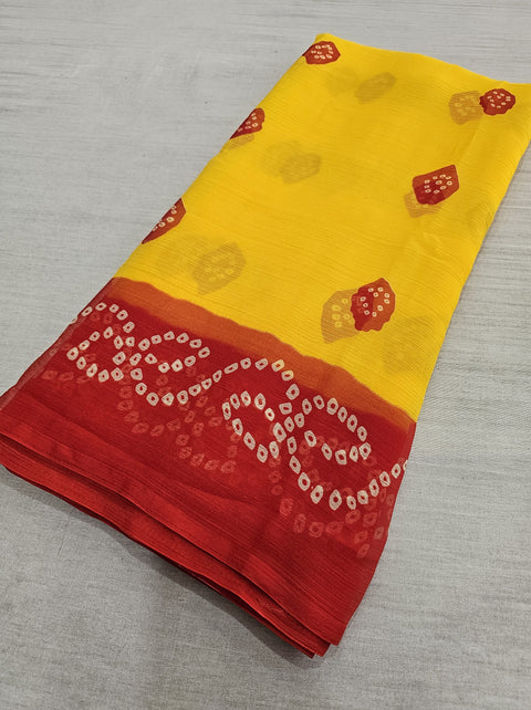 560009 Red and Yellow Chiffon Pila Bandhani Saree