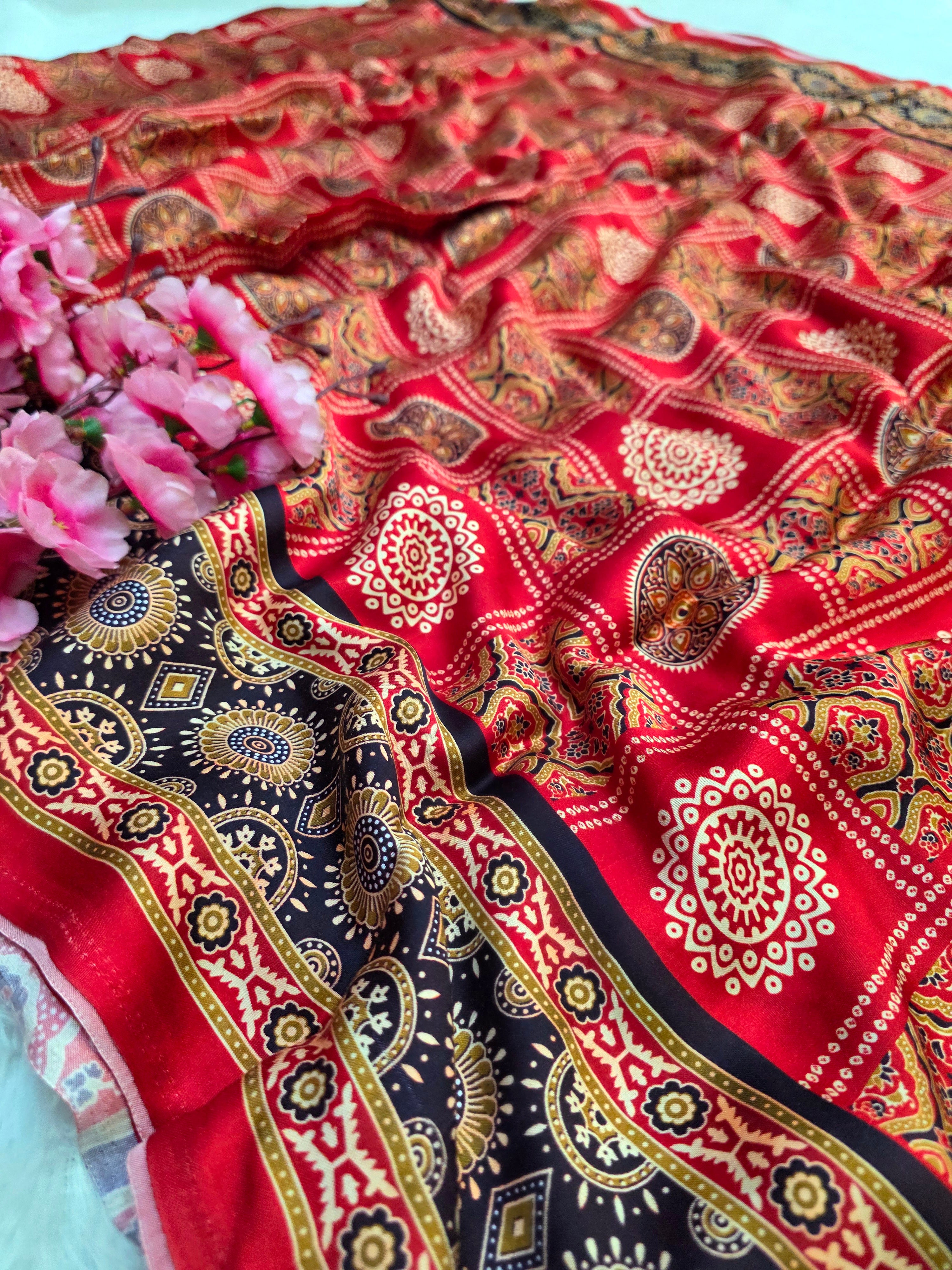 828002 Unique Ajrakh Saree with Lagadi Patta