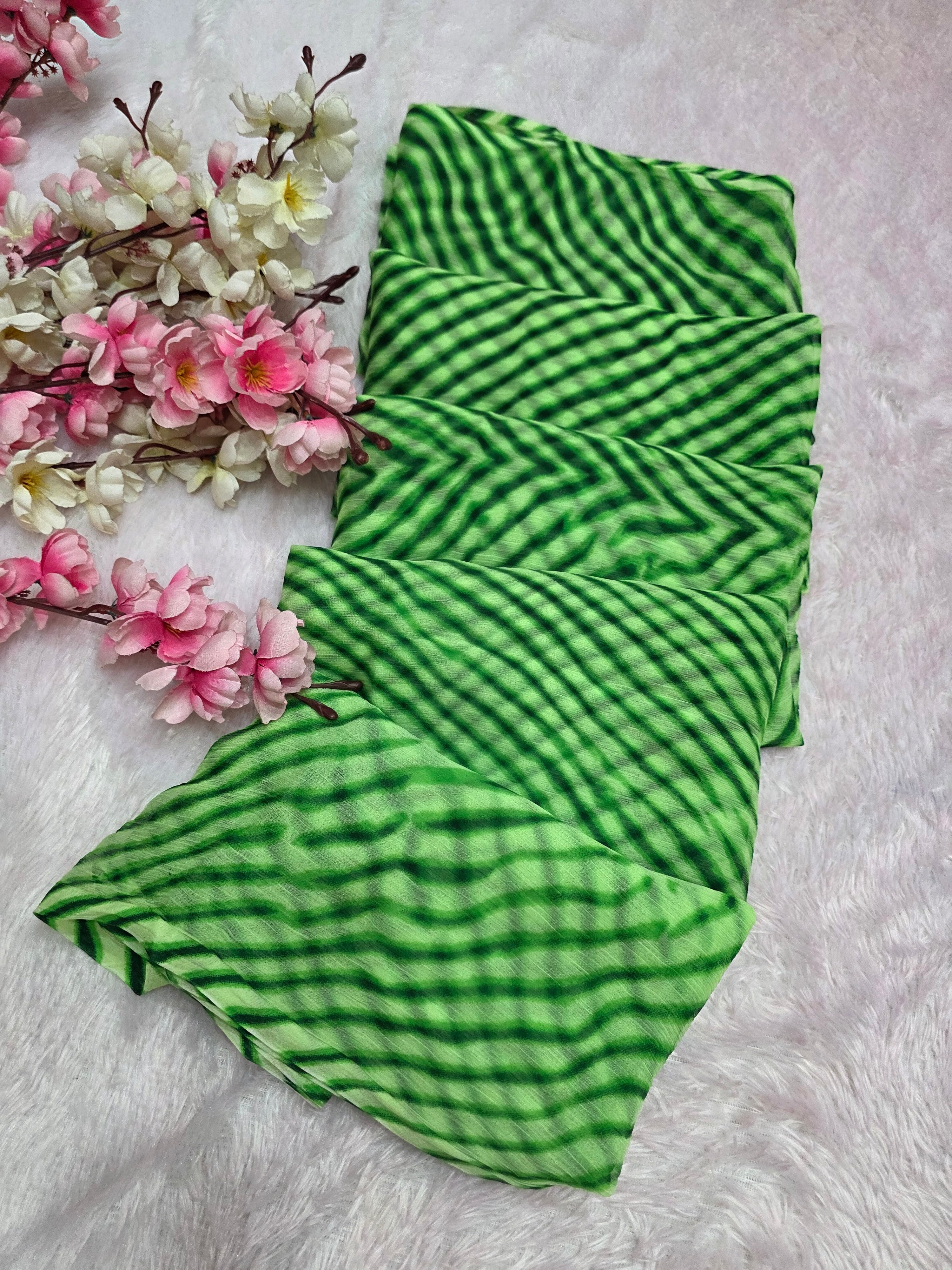 644001 एक्सक्लूसिव शिफॉन फ्लावर प्रिंट साड़ी - हरा 