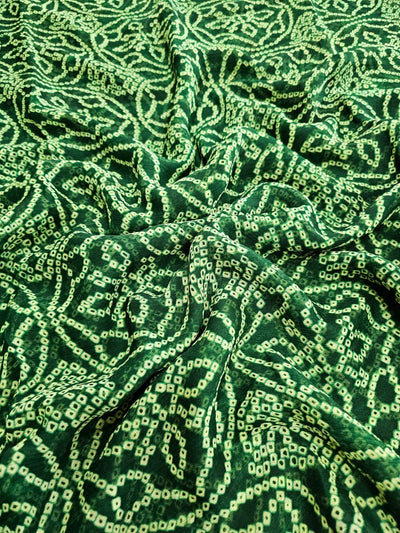 635007 एक्सक्लूसिव बंधनी प्रिंट सेमी शिफॉन साड़ी - गहरा हरा 