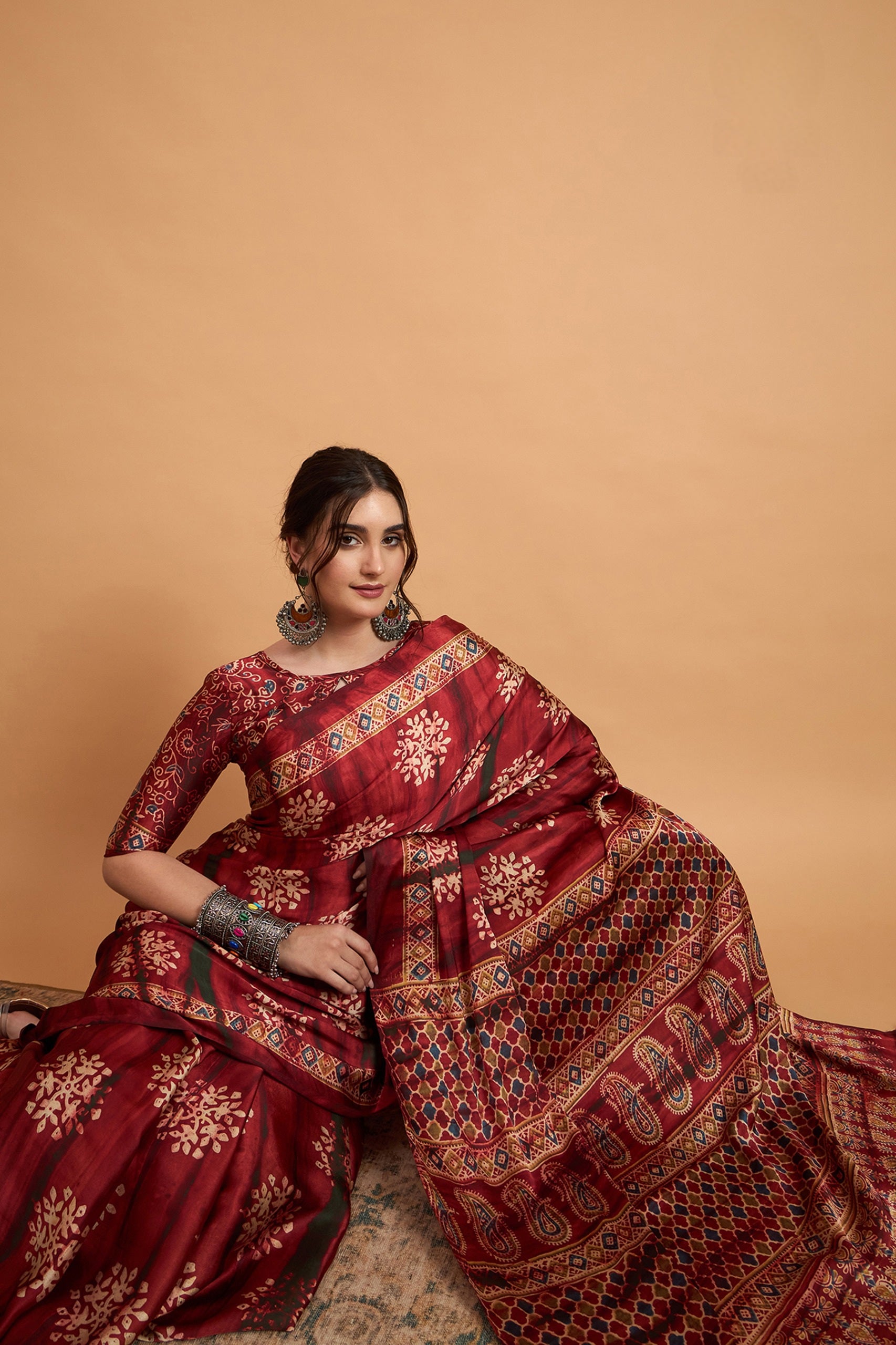 836002 Trending Ajrakh Print Semi Modal Silk Saree - Wine