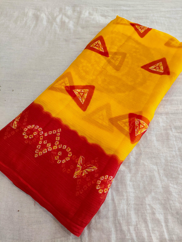 560005 Red and Yellow Pila Bandhani Saree 389003