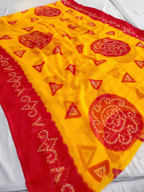 560005 Red and Yellow Pila Bandhani Saree 389003