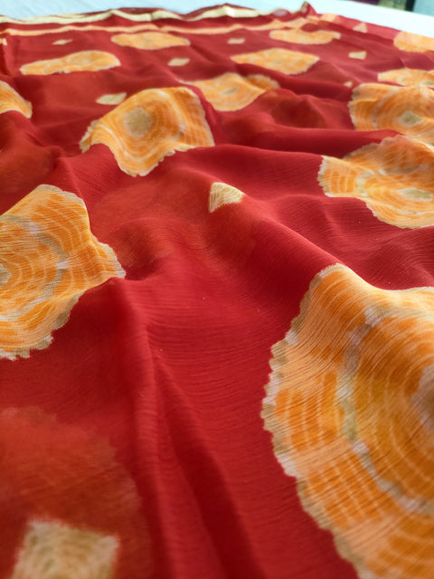 421003 Semi Chiffon Bandhani Saree - Red Orange