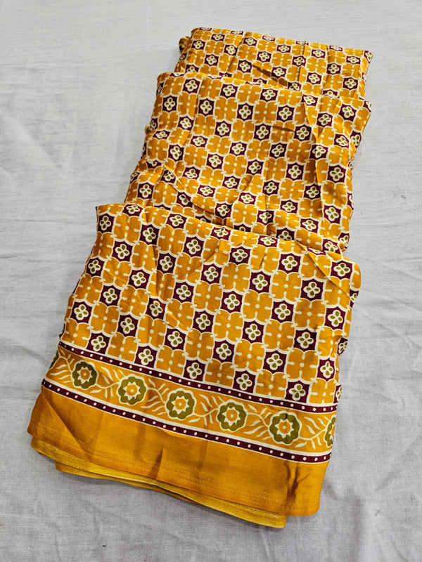 682004 Trending Ajrakh Print Italian Crepe Silk Saree - Yellow