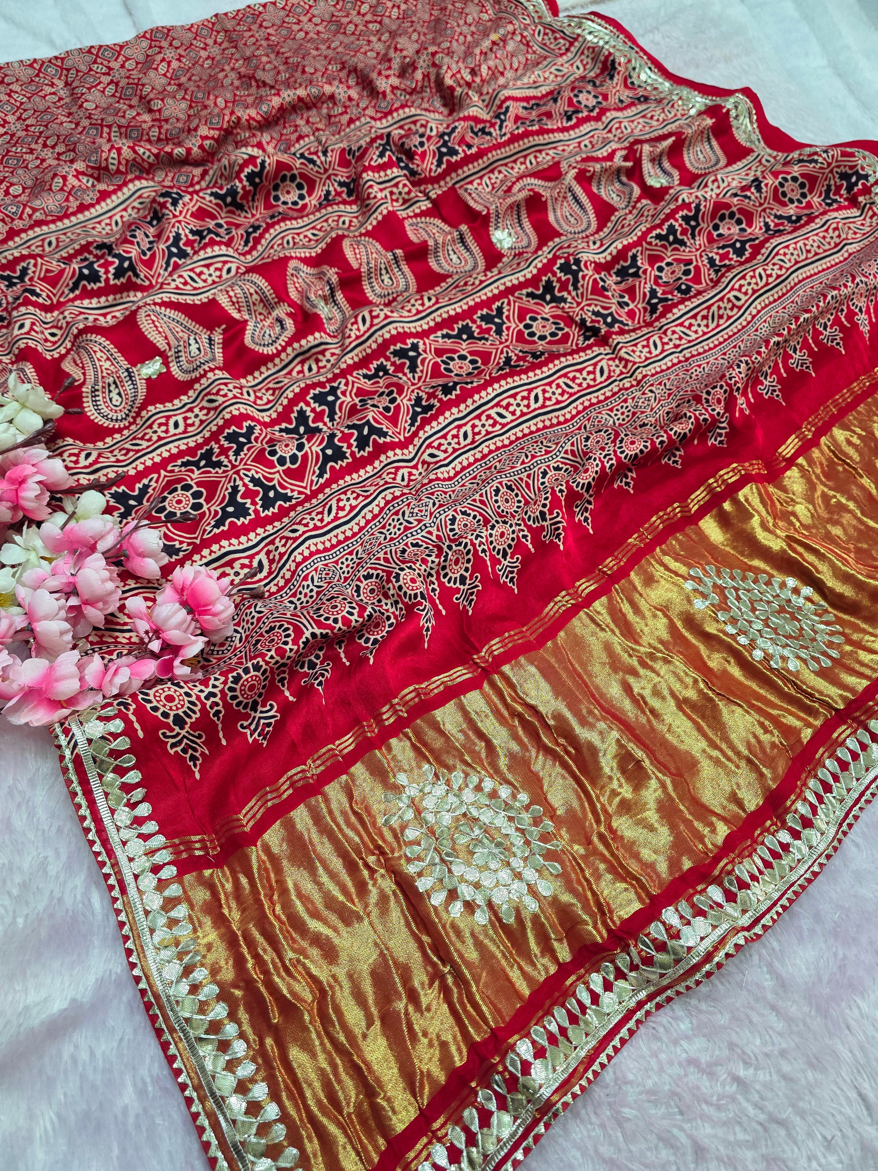 966005 Traditional Modal Silk Ajrakh Print Saree with Hand Gota Patti Work