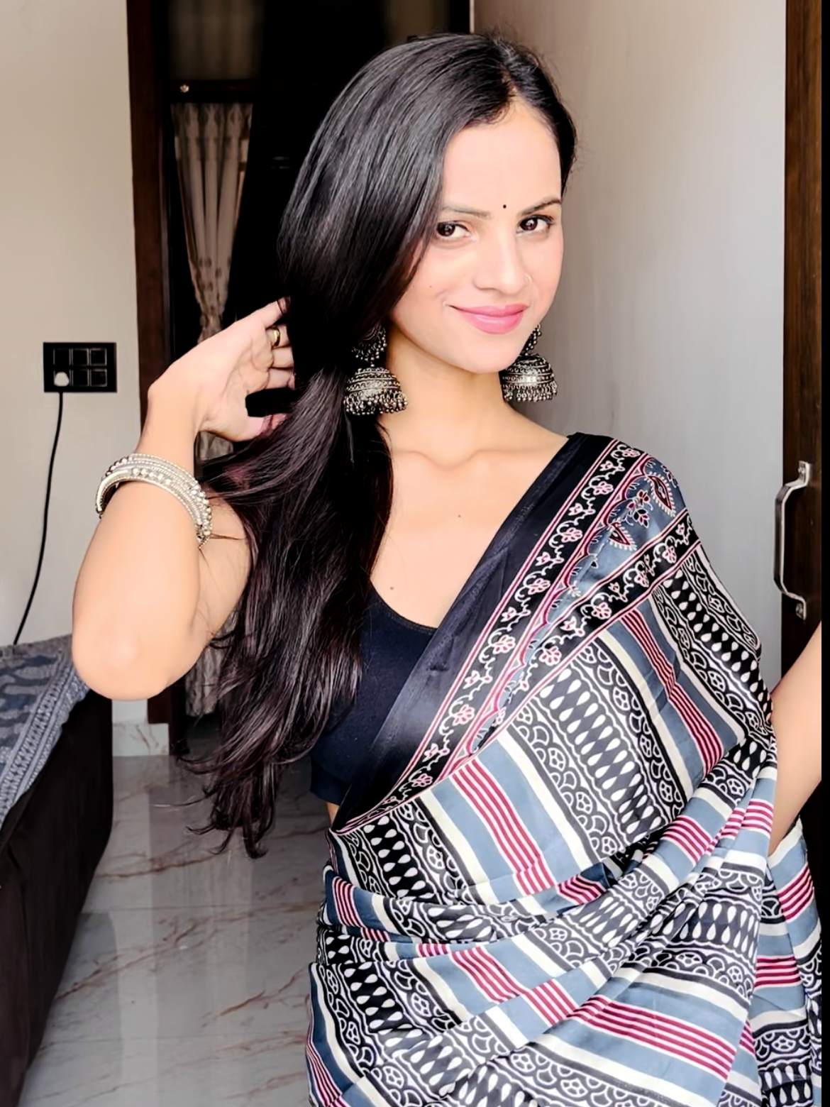 682002 Trending Ajrakh Print Semi Modal Silk Saree