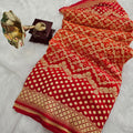 755007 Pure Georgette Red and Orange Rai Dana Bandhani Saree
