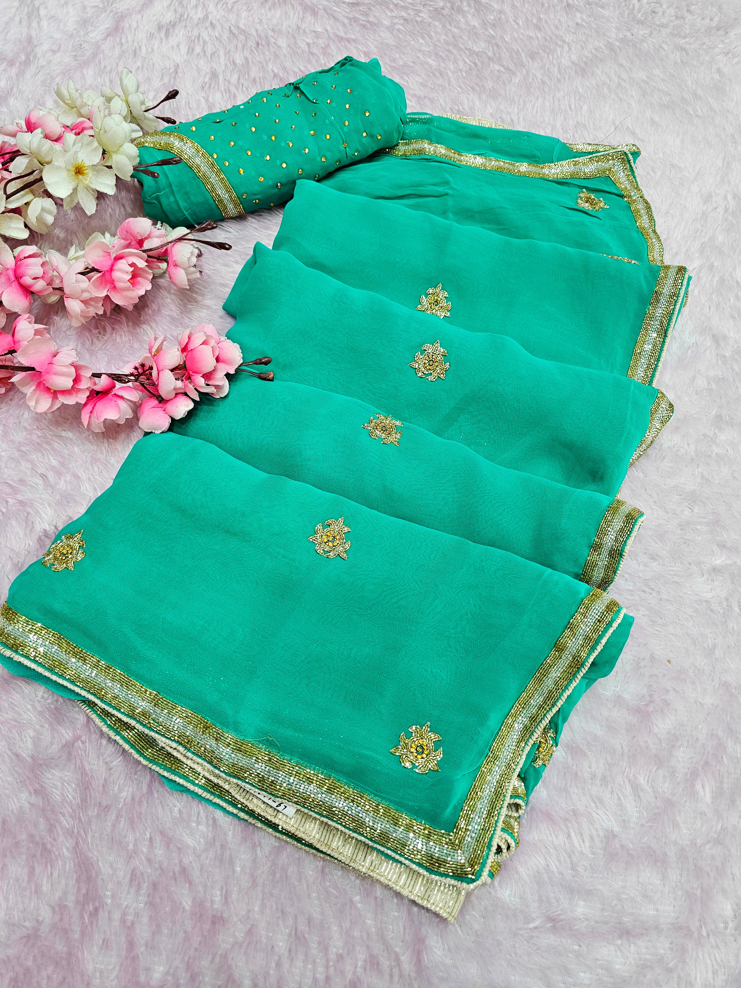 983001 Pure Georgette Fabric Green Saree with Hand Cutdana Work