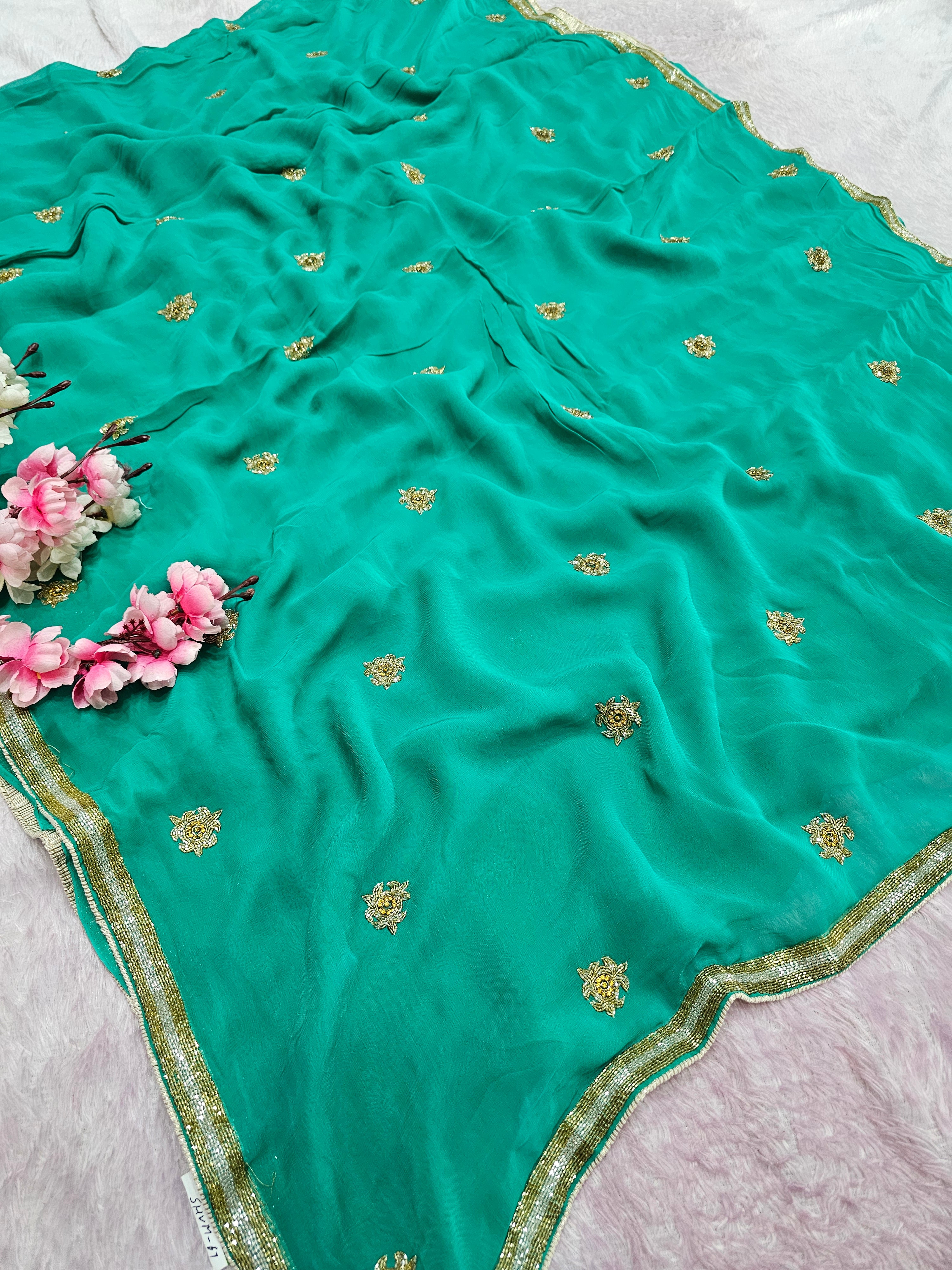 983001 Pure Georgette Fabric Green Saree with Hand Cutdana Work